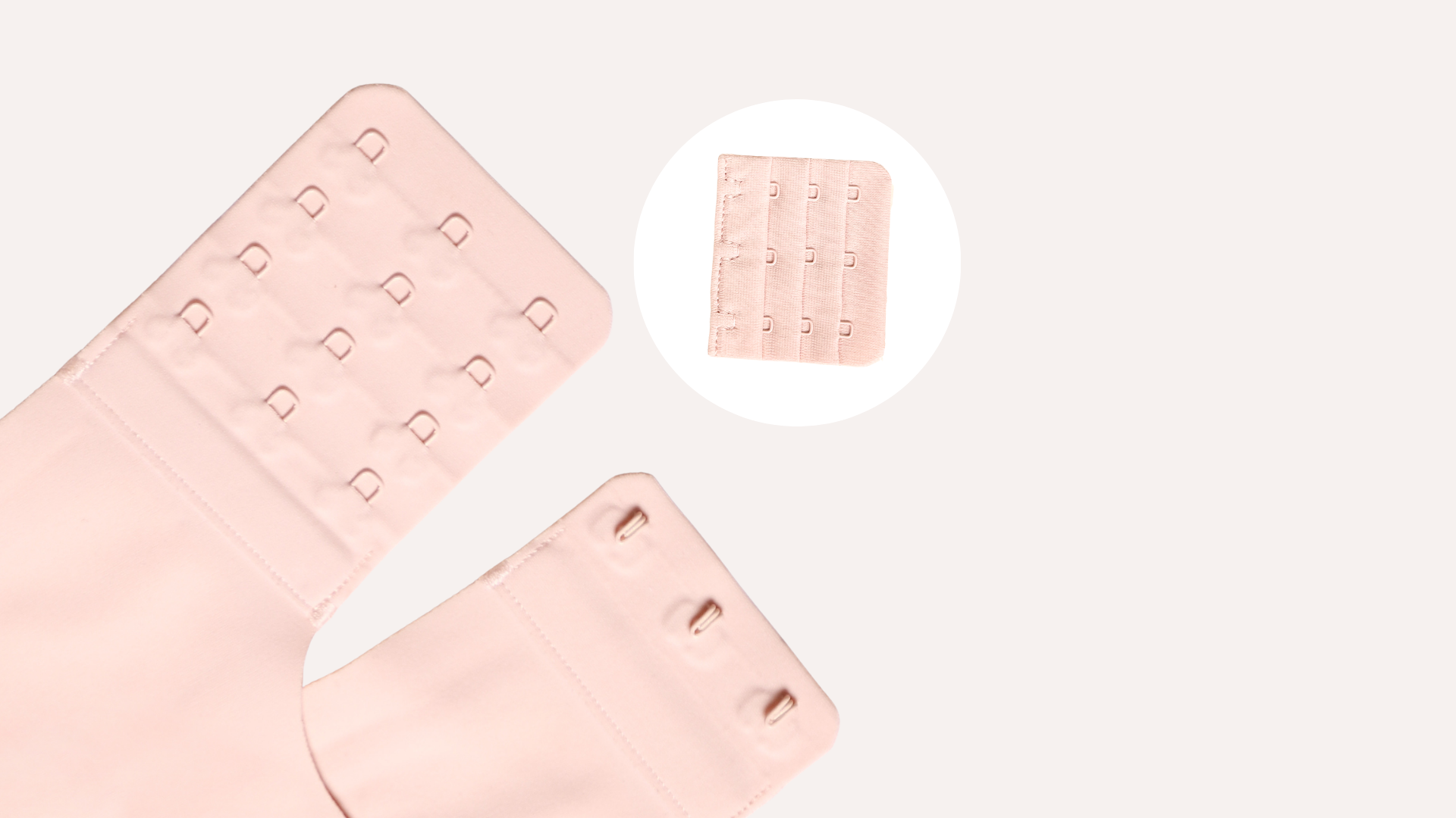 Pink underwire bra on a light pink background with close-up inset.